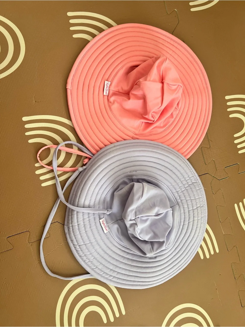 Ruffle Butts Coral and lavender sun or beach hat.